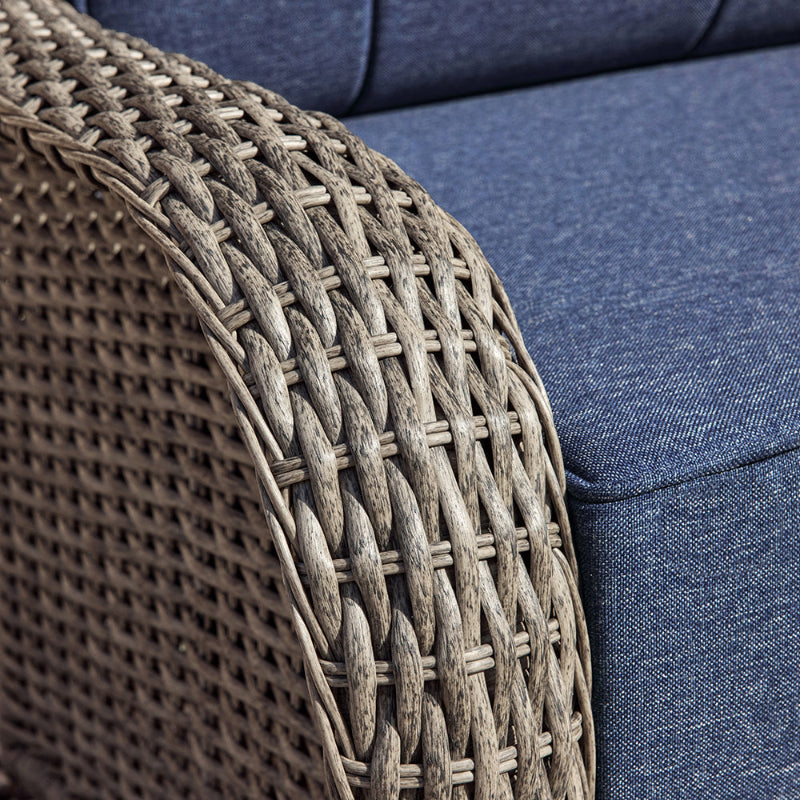 Close-up of a textured brown armrest and blue fabric surface