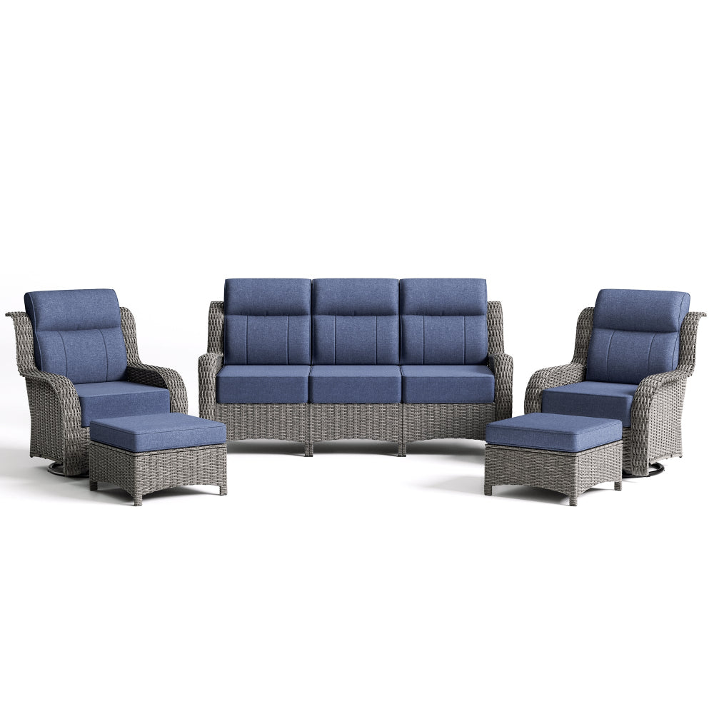 Outdoor furniture set with blue cushions on a white background