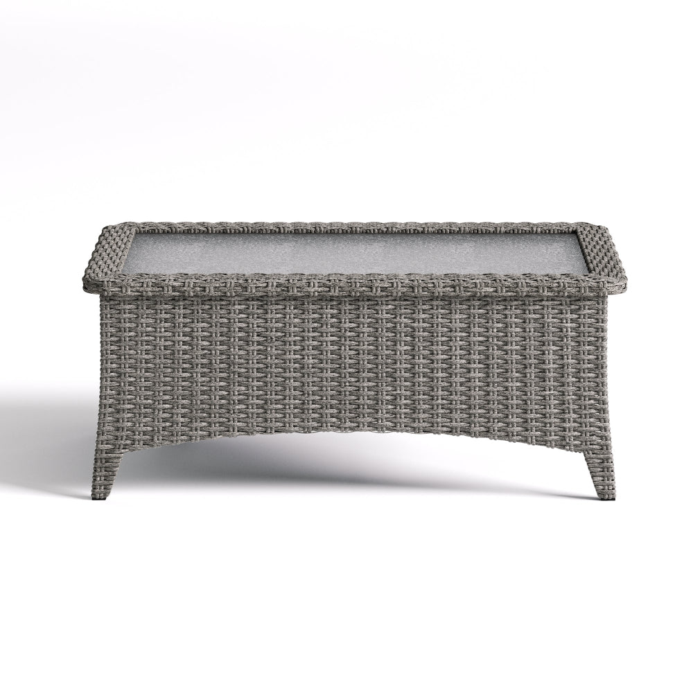 Gray wicker coffee table with glass top on a white background